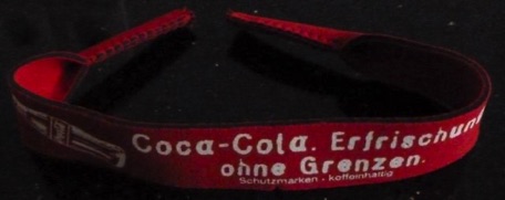 9091-1 € 1,50 coca cola bandje voor aan bril